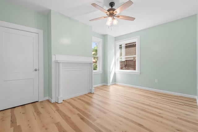 interior space featuring ceiling fan and light hardwood / wood-style flooring