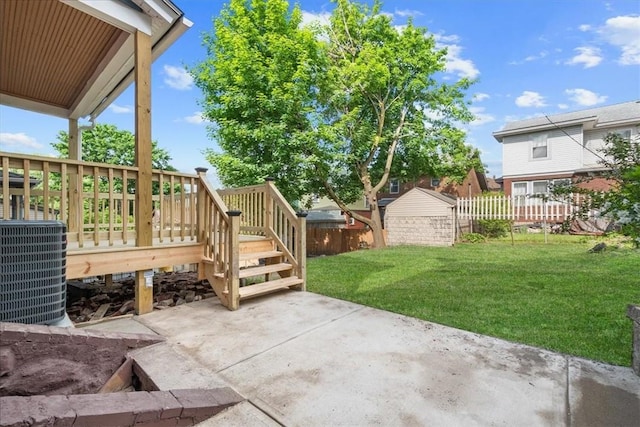 view of patio / terrace featuring a deck and central AC unit