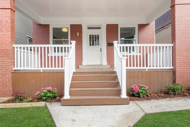 property entrance featuring covered porch