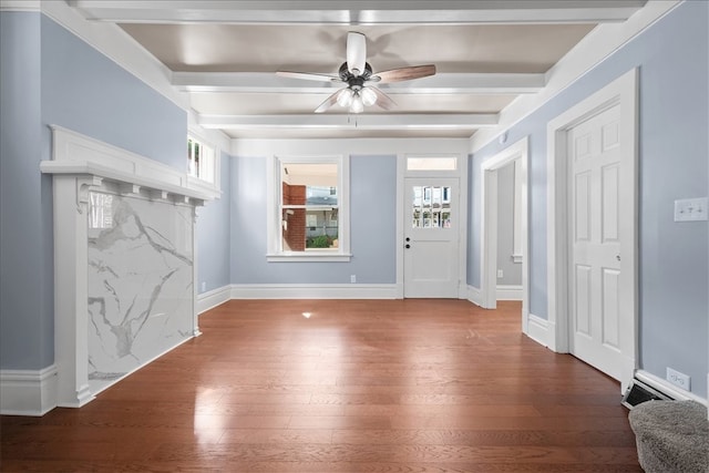 entrance foyer featuring beamed ceiling, ceiling fan, and hardwood / wood-style flooring