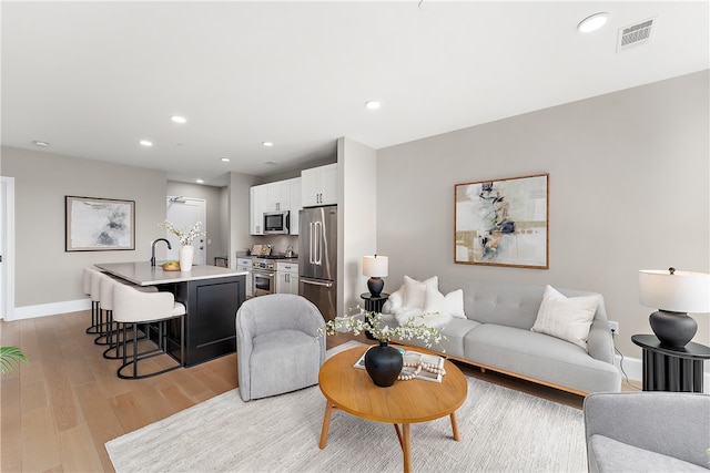 living room featuring light hardwood / wood-style floors