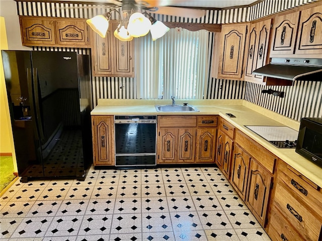 kitchen featuring sink, ceiling fan, light tile patterned flooring, and black appliances