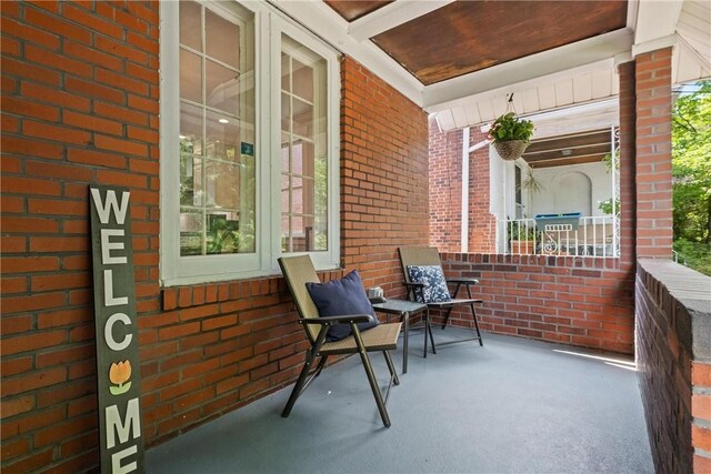 balcony featuring covered porch