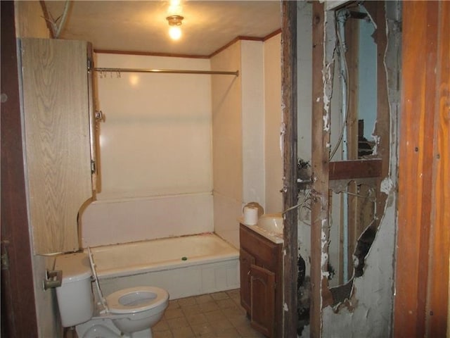 bathroom with toilet, tile patterned floors, and vanity