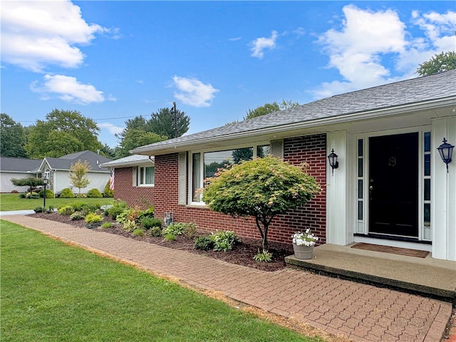 view of front of home with a front lawn