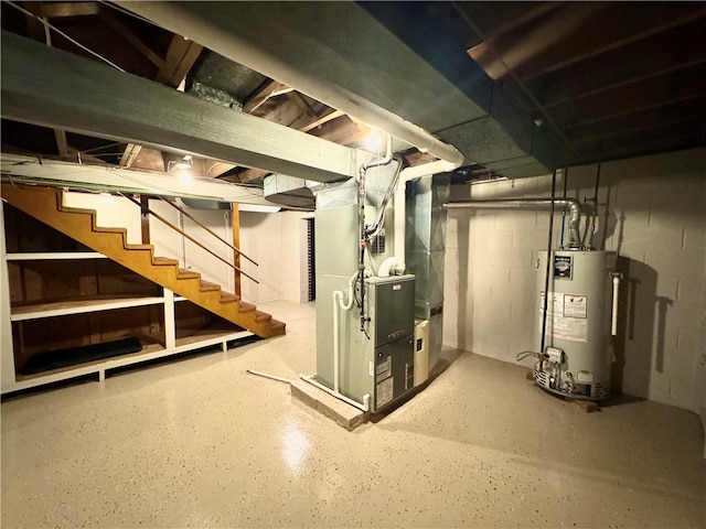 basement featuring heating unit and water heater