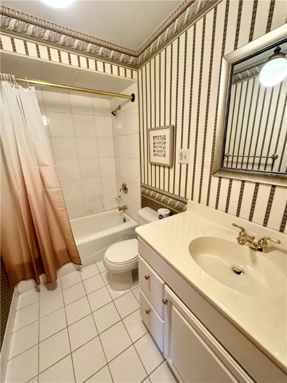 full bathroom featuring tile patterned flooring, toilet, vanity, and shower / bathtub combination with curtain