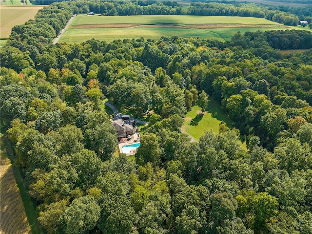 birds eye view of property with a rural view