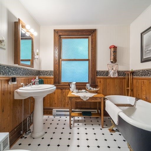 bathroom with sink and a bathing tub