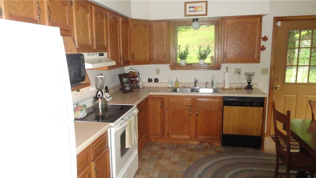 kitchen with white appliances and sink