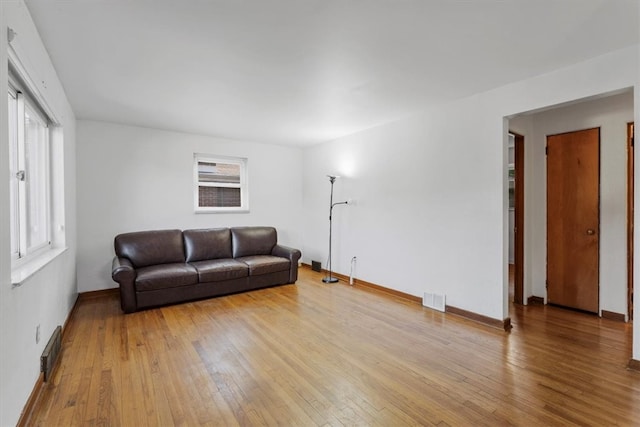 living room with light hardwood / wood-style floors