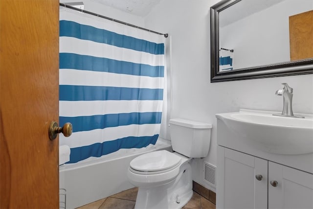 full bathroom with tile patterned floors, toilet, shower / tub combo with curtain, and vanity