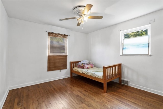 bedroom featuring ceiling fan and hardwood / wood-style floors