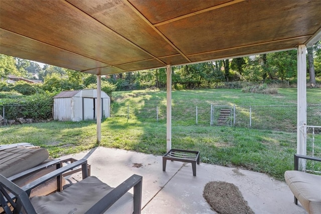 view of patio / terrace featuring a storage unit