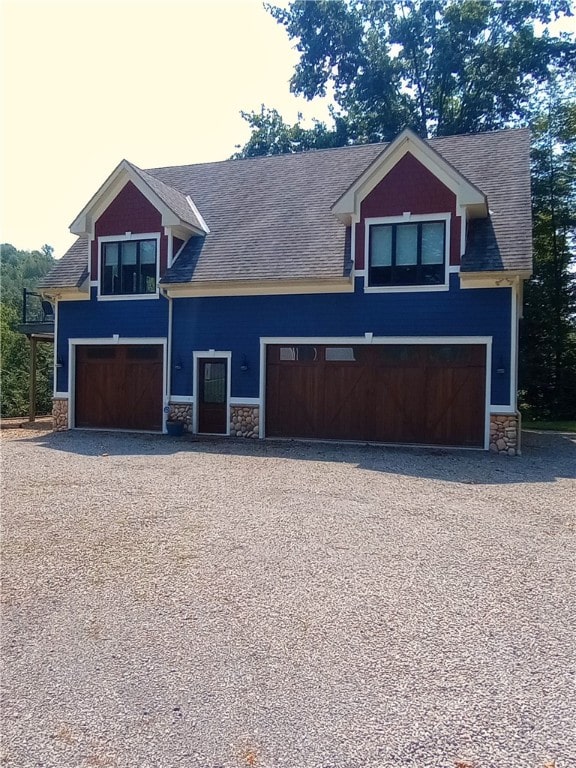 craftsman house with a garage