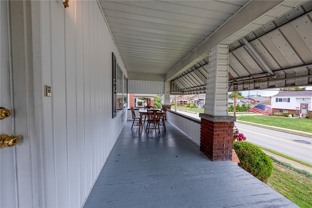 view of patio featuring a porch