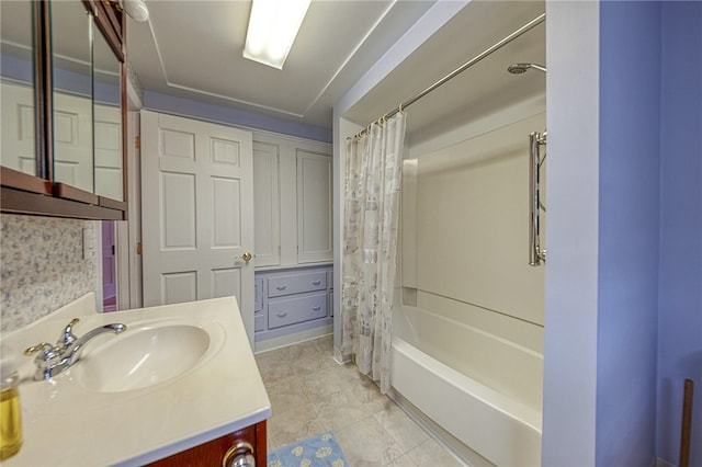 bathroom featuring tile patterned flooring, shower / tub combo with curtain, and vanity