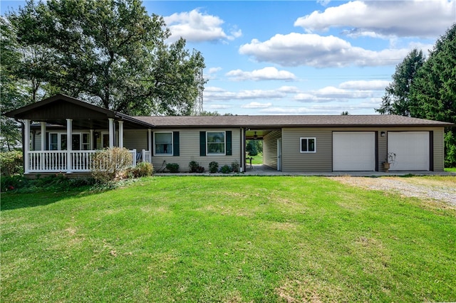 ranch-style house with a garage, covered porch, and a front yard