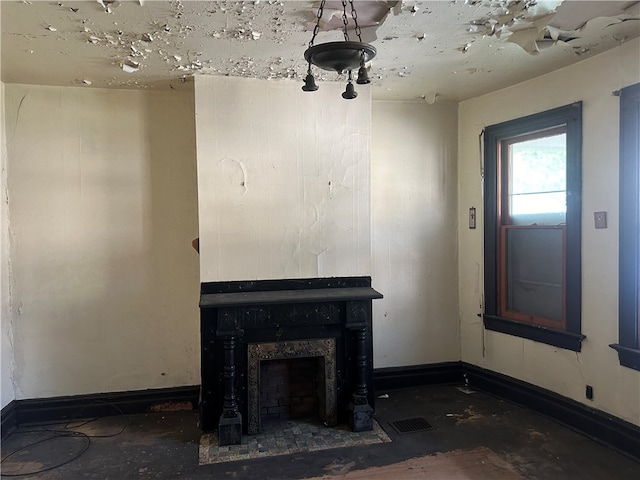 unfurnished living room with a fireplace