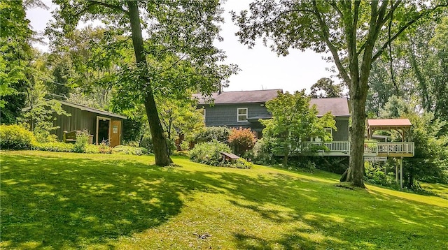 view of yard featuring a deck