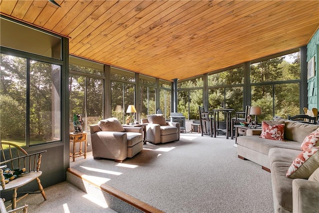 sunroom featuring wooden ceiling