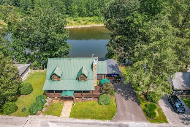 birds eye view of property featuring a water view