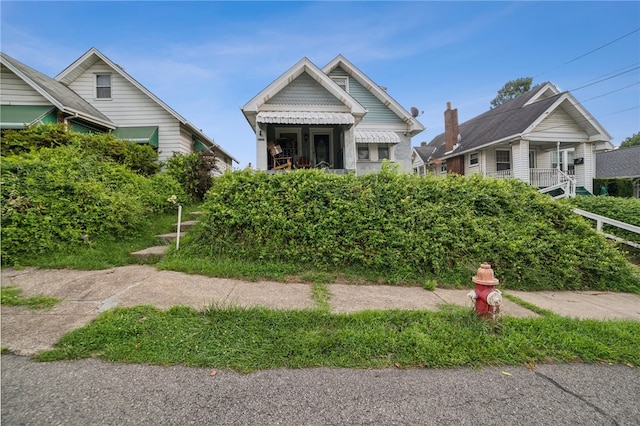 view of front of house with a balcony