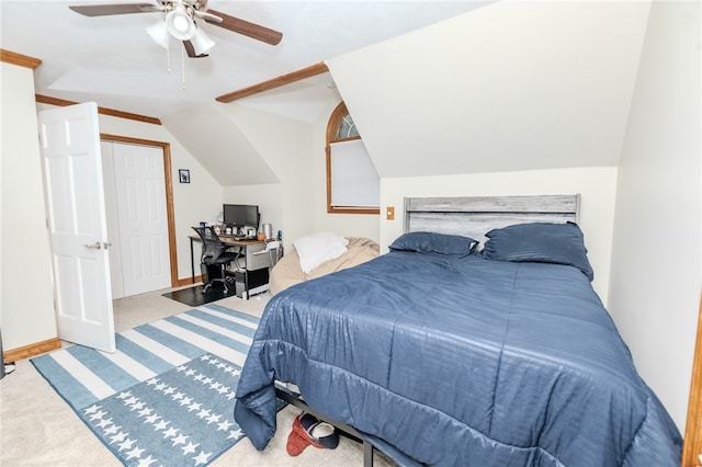 carpeted bedroom featuring ceiling fan and lofted ceiling