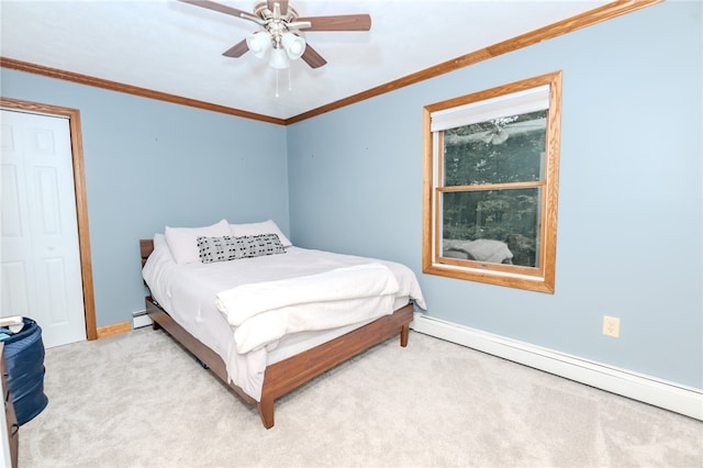 bedroom with ceiling fan, ornamental molding, carpet, and a baseboard radiator