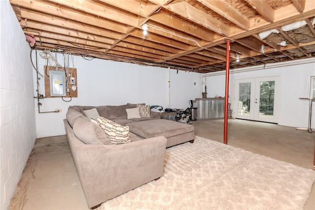 basement with french doors and electric panel