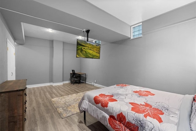 bedroom with light hardwood / wood-style floors