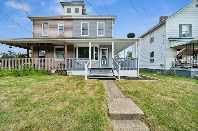 country-style home featuring a front lawn and a porch