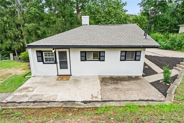 rear view of house with a patio