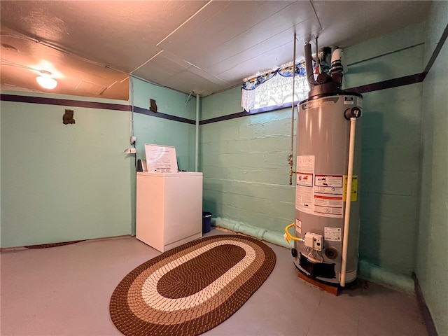 utilities featuring gas water heater and washer / dryer