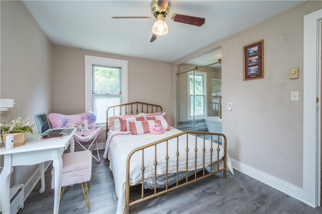 bedroom with ceiling fan, crown molding, and hardwood / wood-style flooring