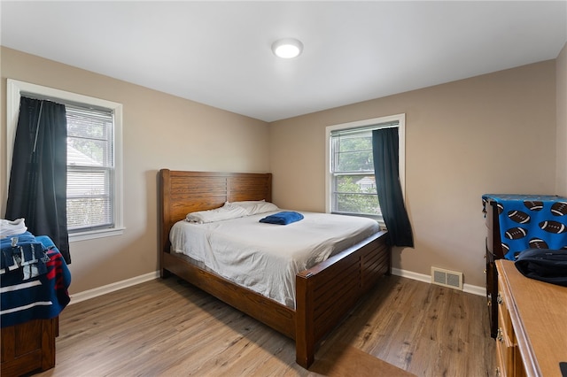 bedroom featuring light hardwood / wood-style flooring