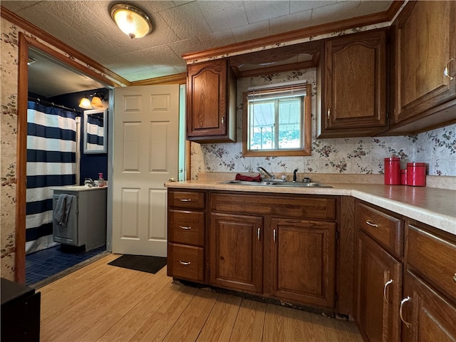 kitchen featuring sink and light hardwood / wood-style floors