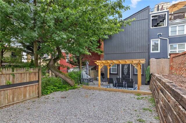 exterior space with a pergola and a patio area