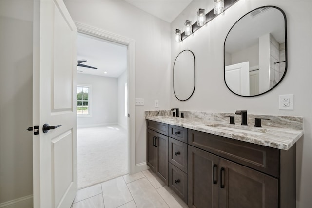 bathroom featuring vanity and tile patterned flooring