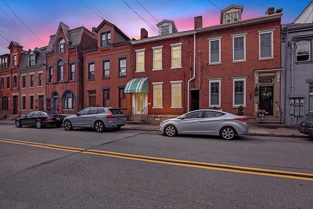 view of property at dusk