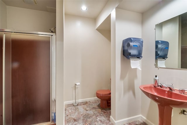 bathroom featuring toilet, an enclosed shower, and tile patterned flooring