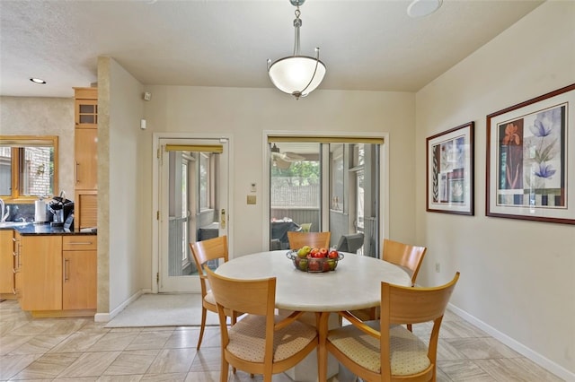 dining room featuring light tile patterned floors