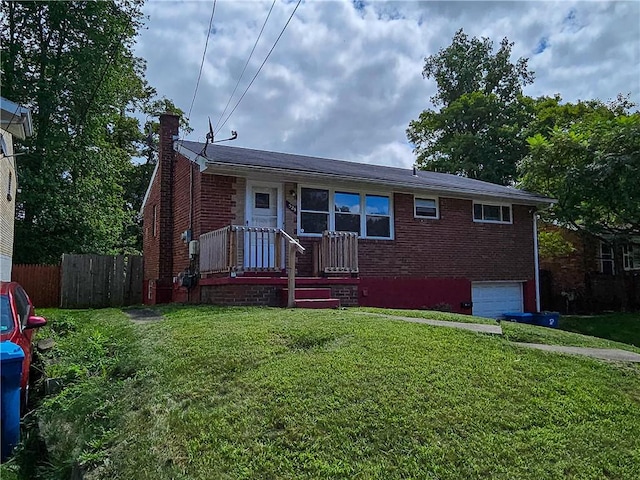 view of front of property featuring brick siding, a chimney, an attached garage, fence, and a front lawn