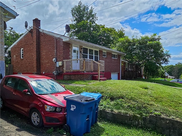 view of property exterior with a yard