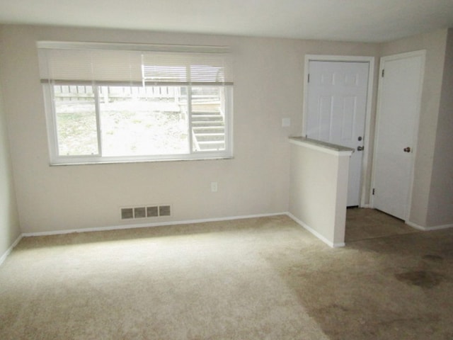 view of carpeted spare room