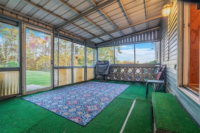 unfurnished sunroom with wooden ceiling and vaulted ceiling