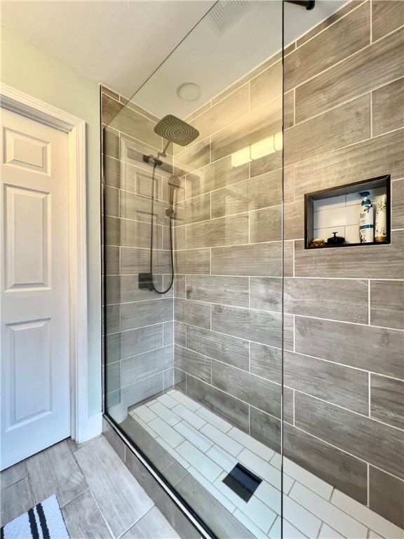 bathroom featuring walk in shower