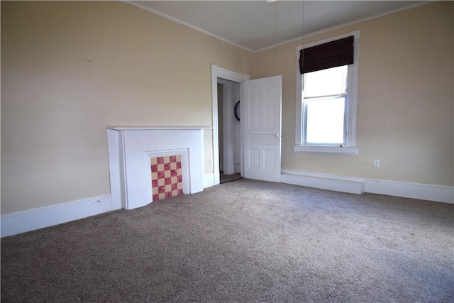 carpeted spare room with baseboards and ornamental molding