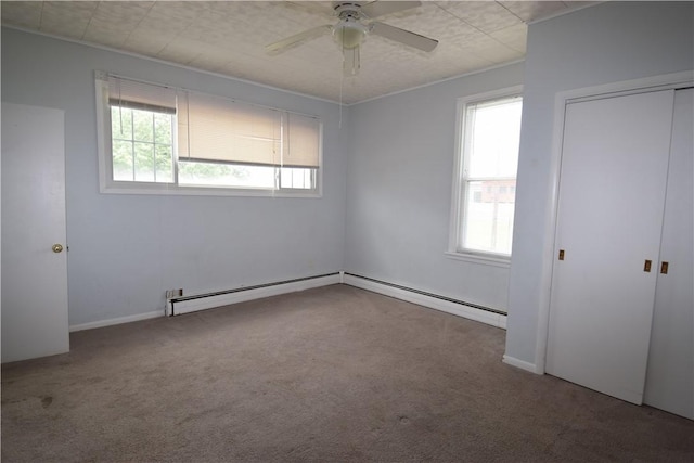 unfurnished bedroom with ceiling fan, a closet, and carpet flooring