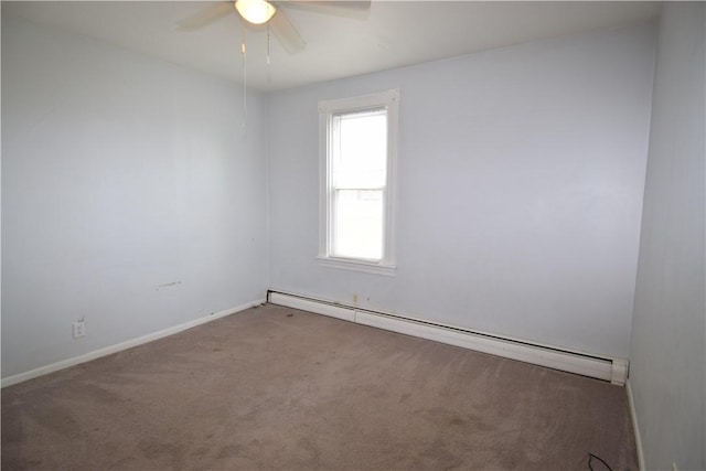 carpeted spare room with a ceiling fan, baseboards, and baseboard heating